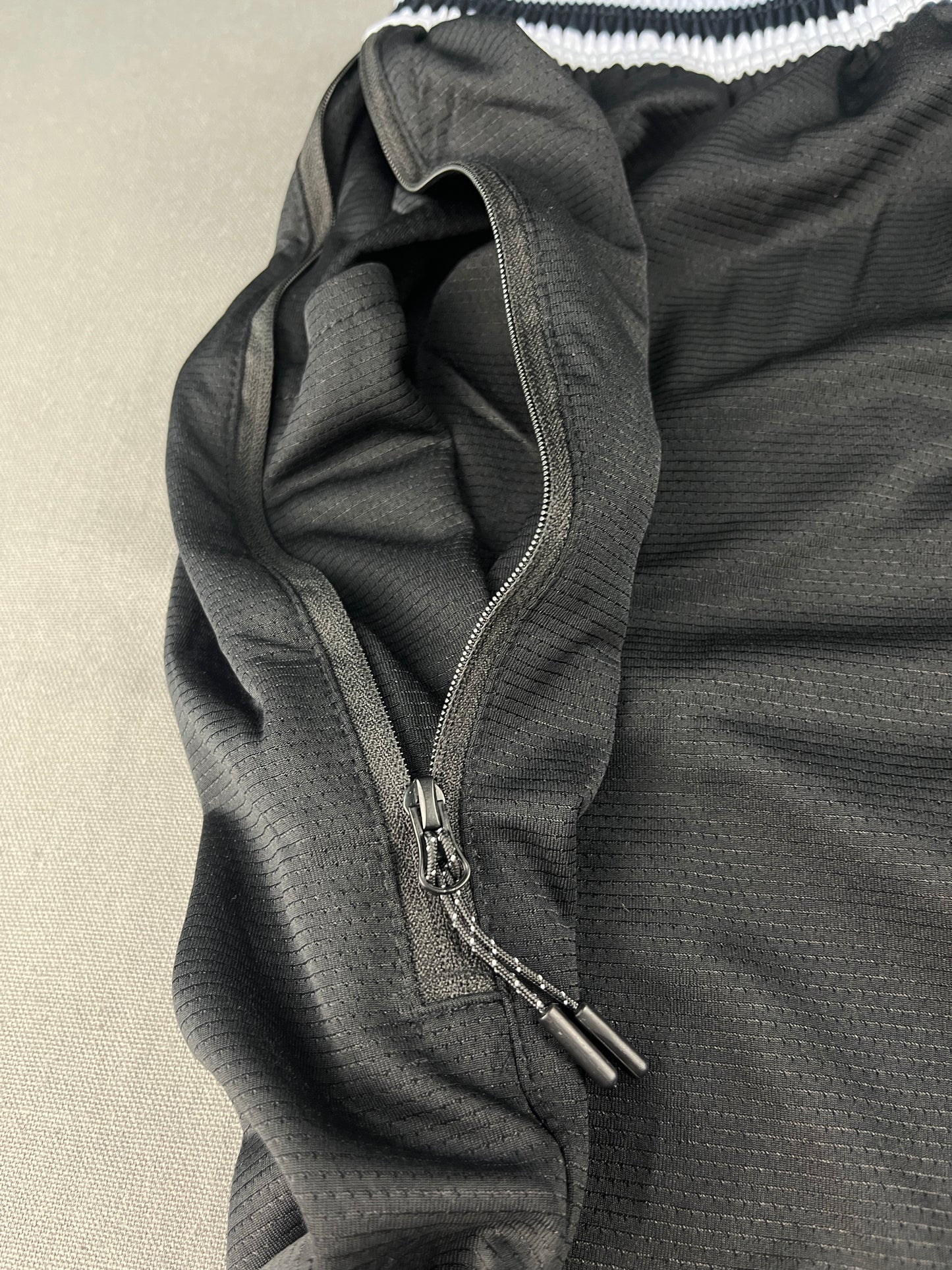 Nike Men’s Black Mesh Basketball Shorts with White Trim