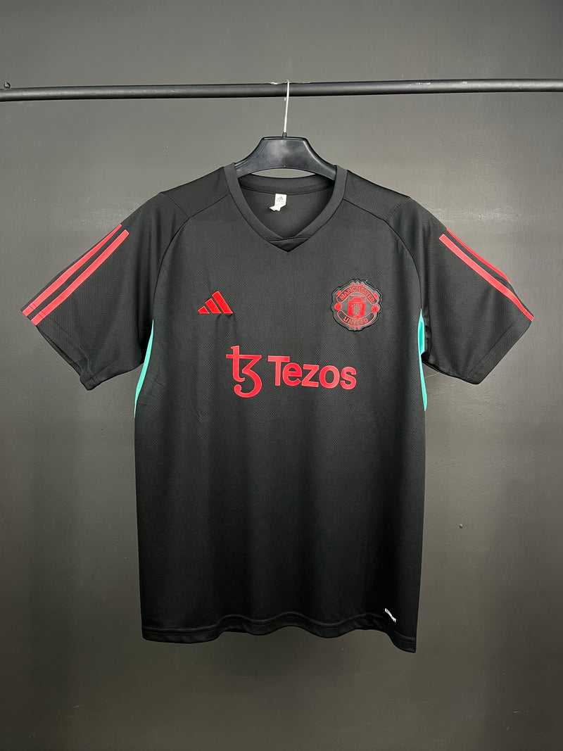 MANCHESTER UNITED TEZOS BLACK TRAINING KIT